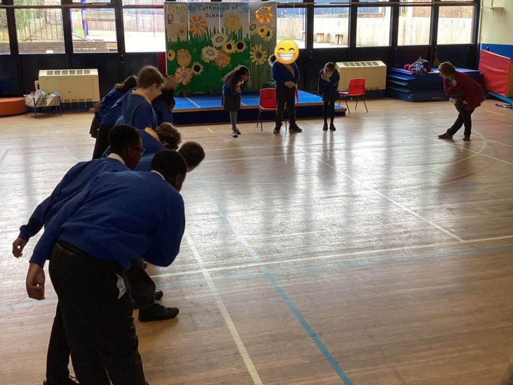 Image shows children at St Catherine of Sienna Primary during a workshop